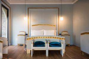 Posteľ alebo postele v izbe v ubytovaní Palazzo Previtera Hotel & Restaurant