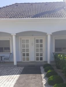 Exteriér alebo vchod do ubytovania Czinger Vendégszobák