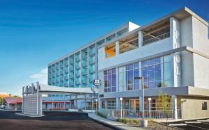 a rendering of a building with a parking lot at Graduate by Hilton Tempe in Tempe