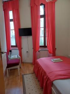 Postel nebo postele na pokoji v ubytování Hotel Asila