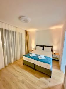 Postel nebo postele na pokoji v ubytování Hotel MM Residence