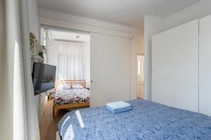 Ένα ή περισσότερα κρεβάτια σε δωμάτιο στο Beautiful Modern Apartment in the Heart of Antwerp