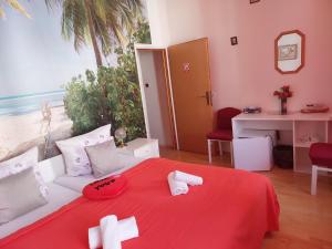 Postel nebo postele na pokoji v ubytování Hotel Asila