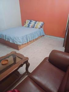 Postel nebo postele na pokoji v ubytování TULEAR APPARTEMENTS CHAMBRES Rez de chaussée et Etage