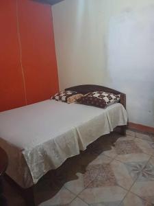 Postel nebo postele na pokoji v ubytování TULEAR APPARTEMENTS CHAMBRES Rez de chaussée et Etage