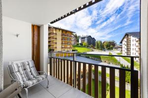 En balkon eller terrasse på Les Genets 157 - 4 pers - piscine