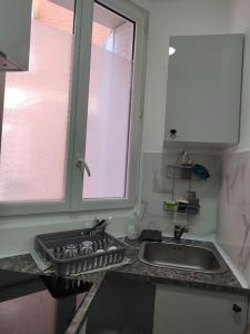 Fotografie z fotogalerie ubytování Studio à deux pas du métro v destinaci Gennevilliers