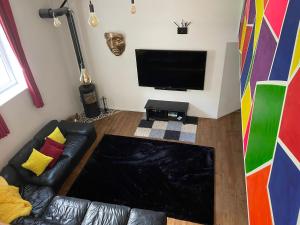 TV a/nebo společenská místnost v ubytování Home in Sourdeval