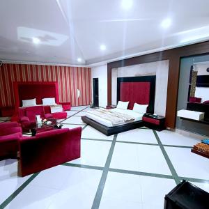 Ένα ή περισσότερα κρεβάτια σε δωμάτιο στο Hotel Grace Inn Multan