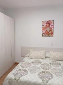 En eller flere senge i et værelse på Plaza España RIO