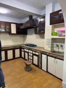 Kuchyň nebo kuchyňský kout v ubytování Om Tara Guest House Pvt Ltd