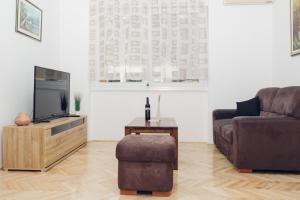 TV a/nebo společenská místnost v ubytování Apartman Marija Ilok