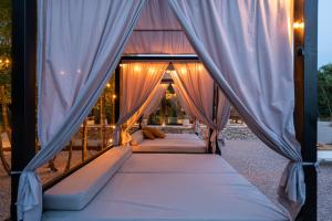 Giường trong phòng chung tại Casa Al Lavere 2363 +42 ảnh