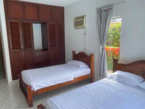 En eller flere senge i et værelse på Casa campestre en Melgar + 38 billeder