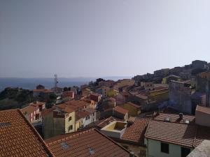 a view of a city with red roofs at Sa Pruninca in Villanova Monteleone