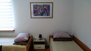 Postel nebo postele na pokoji v ubytování Dangus