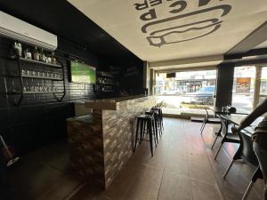 Ruang duduk di Xenius Hotel - Apt Particular