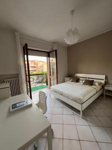 Postel nebo postele na pokoji v ubytování L'Onda - B&B