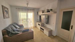 Et tv og/eller underholdning på Chipiona - Playa a 200m terraza piscina padel