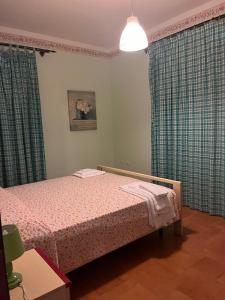 Postel nebo postele na pokoji v ubytování Agriturismo Nardini