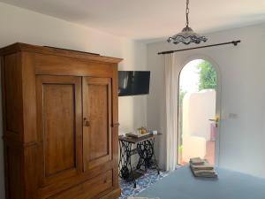 TV a/nebo společenská místnost v ubytování Casa Blu