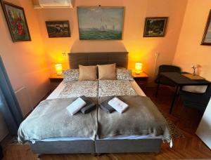 Postel nebo postele na pokoji v ubytování RELAX13 Vendégház