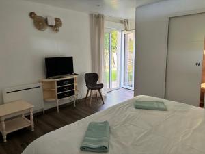 La villa Émeraude客房内的一张或多张床位