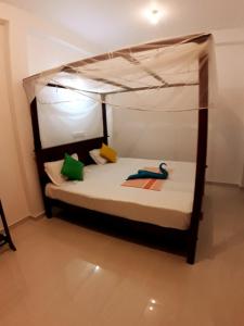 Voodi või voodid majutusasutuse Sasagara Beach Villa toas