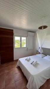 Postel nebo postele na pokoji v ubytování Appartement T3 proche de la mer