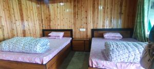 Zero Points TheLaure Cottage 객실 침대