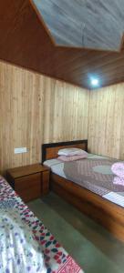 Zero Points TheLaure Cottage 객실 침대