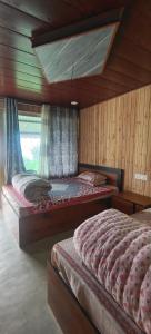 Zero Points TheLaure Cottage 객실 침대