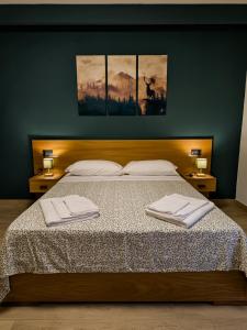 Postel nebo postele na pokoji v ubytování Borgo dei cervi B&B