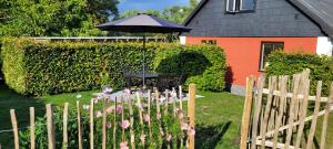 Zahrada ubytování Röda huset Kåseberga
