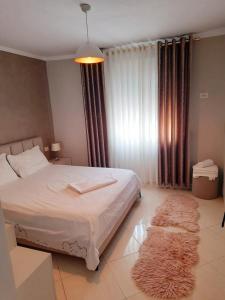 Postel nebo postele na pokoji v ubytování Stela Apartment