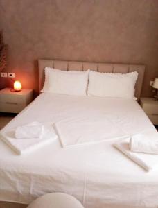 Postel nebo postele na pokoji v ubytování Stela Apartment + 7 fotografií