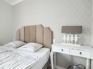 Postel nebo postele na pokoji v ubytování Motyl Noclegi Bytom