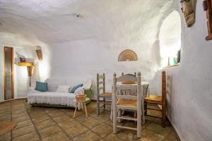 Et opholdsområde på Alojamiento Cuevas Victoria + 92 billeder