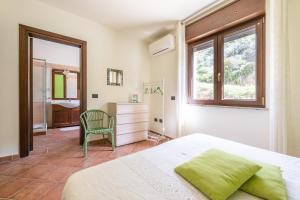 Postel nebo postele na pokoji v ubytování B&B Pedra Rubia