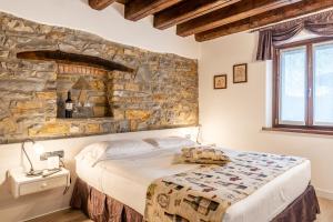 Posteľ alebo postele v izbe v ubytovaní Il Roncal Wine Resort - for Wine Lovers