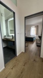 Postel nebo postele na pokoji v ubytování Family Apartments Černice