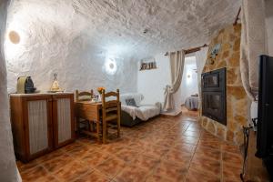 Et tv og/eller underholdning på Alojamiento Cuevas Victoria