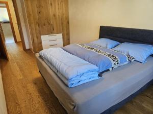 Postel nebo postele na pokoji v ubytování Apartment Judith Truden