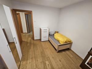 Postel nebo postele na pokoji v ubytování Apartment Judith Truden