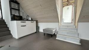 Kuchyň nebo kuchyňský kout v ubytování Family Apartments Černice