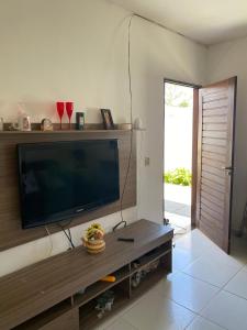 TV a/nebo společenská místnost v ubytování Casa barra nova