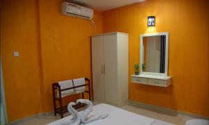 Postel nebo postele na pokoji v ubytování Roo Lanka Homestay