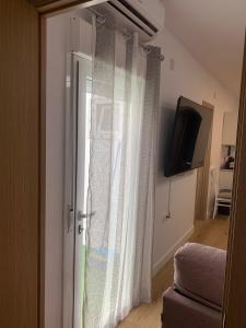 Imagem da galeria de Apartamentos ANDASOL em Chipiona mais 64 fotografias