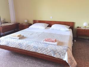Posteľ alebo postele v izbe v ubytovaní Apartments MOST
