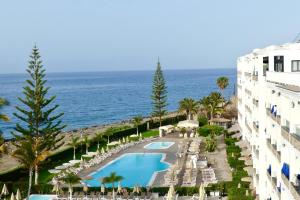 an aerial view of the hotel and the ocean at Canopael in Mogán